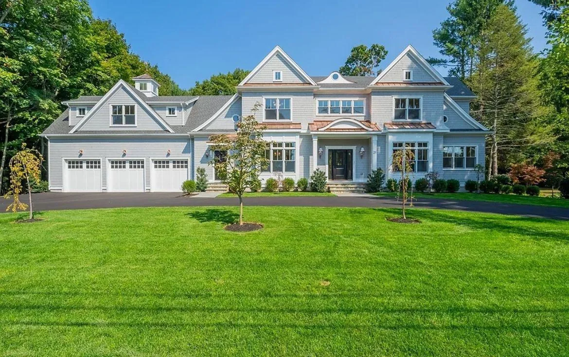 A large custom home built on the South Shore, finished with shingle and trim