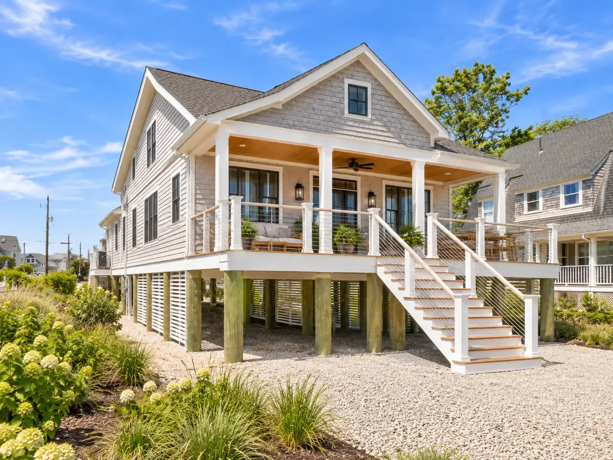 A coastal home on the South Shore with the stair and piling structure visible