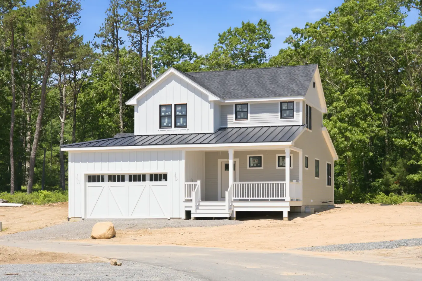 New construction on the South Shore with a standing seam porch roof