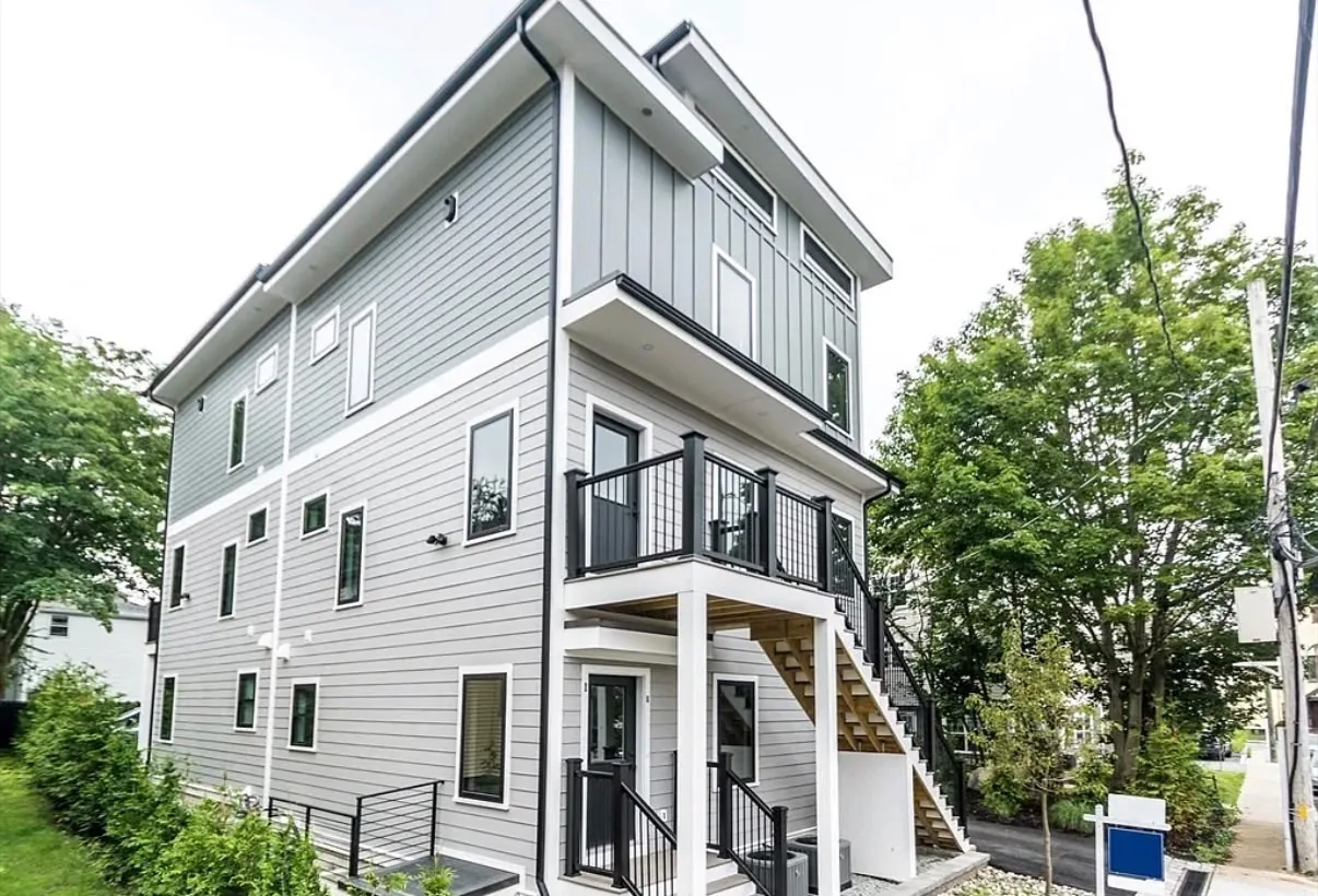 Vertical and lap siding on a three storey South Shore home